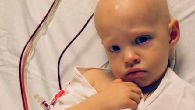 Sheila Quirke's daughter with a sad facial expression, sick without hair who is on Medicaid lying in...