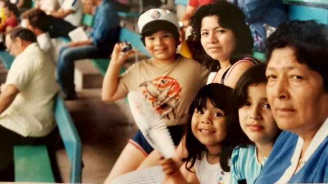 Three kids with their mom and grandmother at a stadium in Florida.