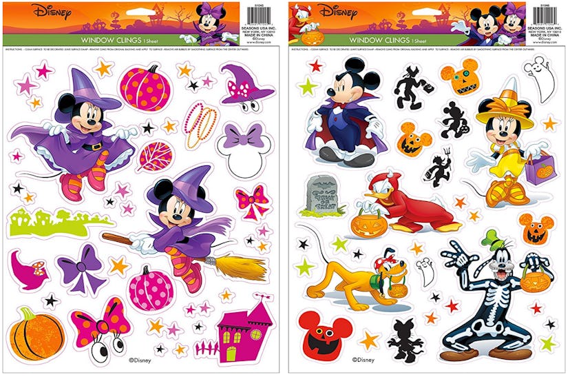 Two packs of Mickey and Minnie Mouse Halloween-themed window clings.