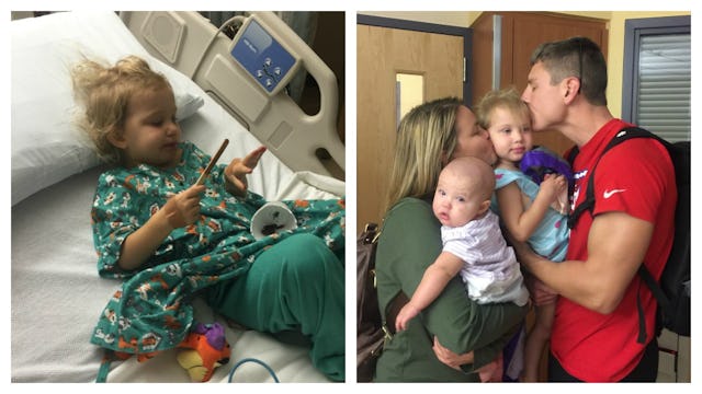 A toddler lying in a hospital bed next to a picture of two parents holding their children and kissin...