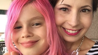 A mother with her transgender daughter with pink hair