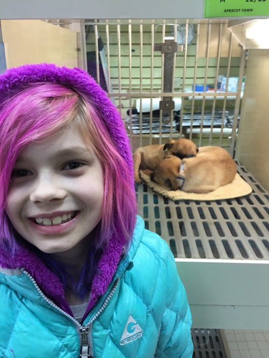 Debi Jackson's transgender girl daughter wearing a blue jacket with purple fur hoodie over her pink ...
