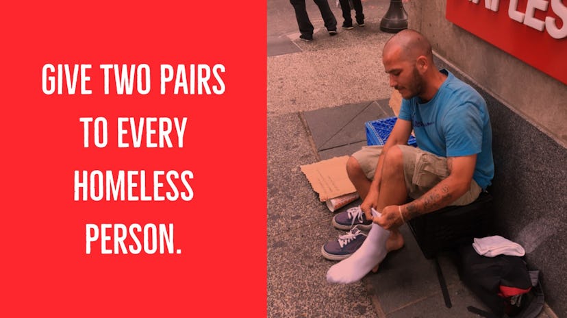 "Give two pairs to every homeless person." text next to a homeless man trying out new white socks