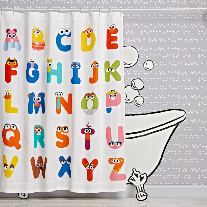 Alphabet shower curtain with Sesame Street characters.
