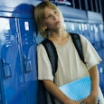 An autistic son leaning against blue lockers as middle is school is brutal to him