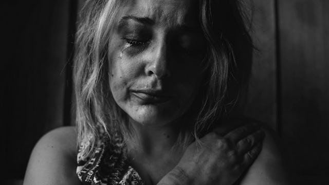 A woman crying because she is sick of being sick