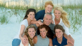 Sandi Honer with her children and late husband at the beach