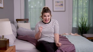 An 18-week pregnant woman excited about all the things her baby can do now, speaking while sitting o...