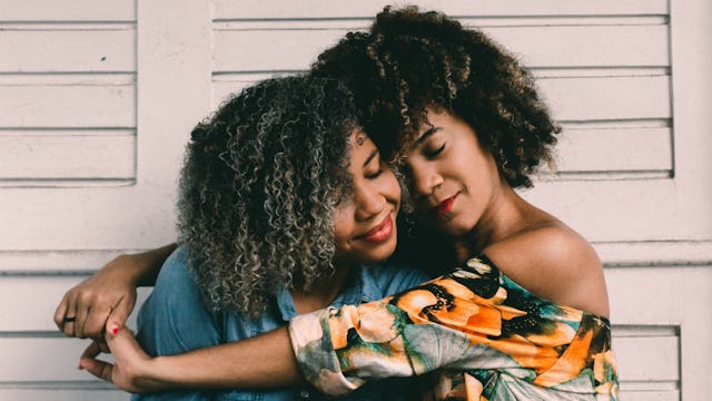 Two women hugging because they have found each other as great friends