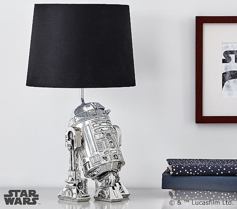 Items From The Star Wars Pottery Barn Collection: R2-D2 Star Wars silver and black lamp.