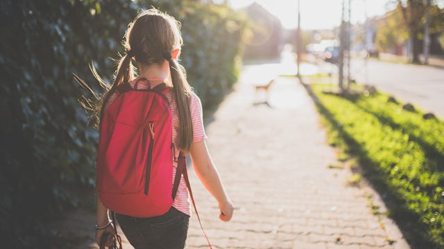 girl walking to school