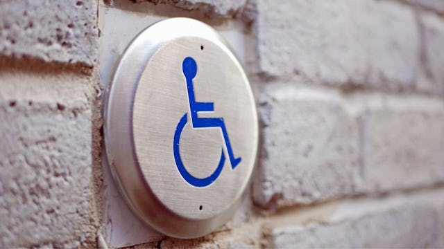 button with andicapped imagine symbolizing disabled people