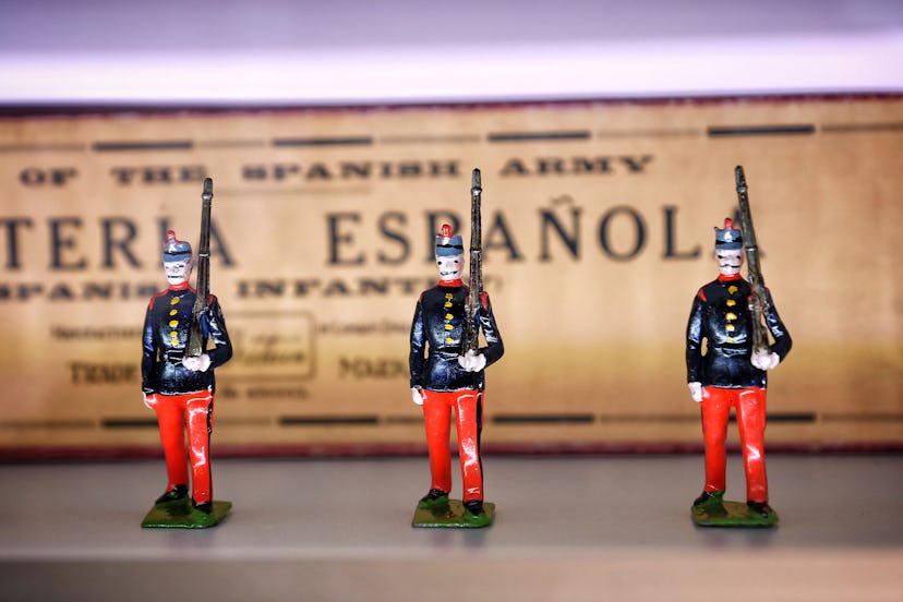 Three antique toy soldiers at the Frazier History Museum