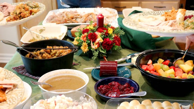 A decorated table filled with food waiting for families and friends to sit and celebrate a holiday