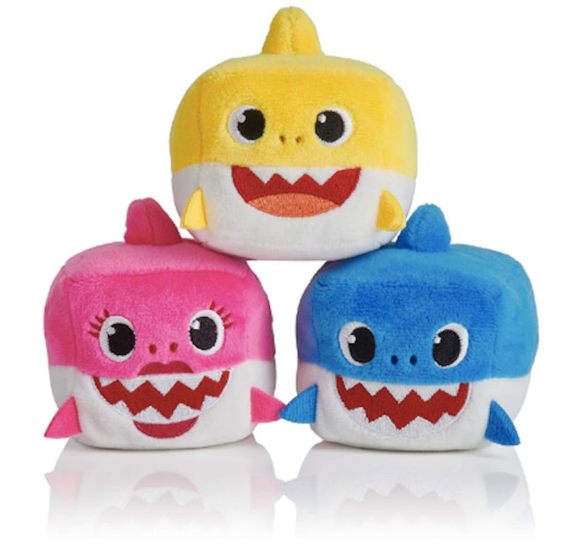  Three singing  "Baby Shark" plushes in yellow, pink and blue