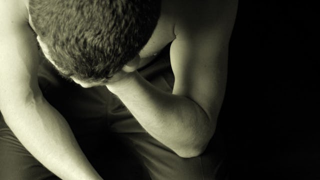 sad teenage boy illustrates parents having to relinquish their children to obtain psychiatric care