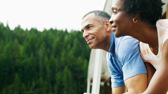 Midlife man and woman enjoying time in nature and falling in love