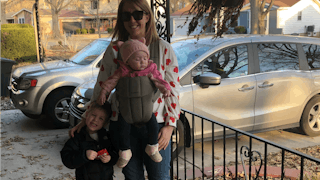 Woman posing with her two kids