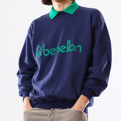 A model wearing a blue Benetton Sweater