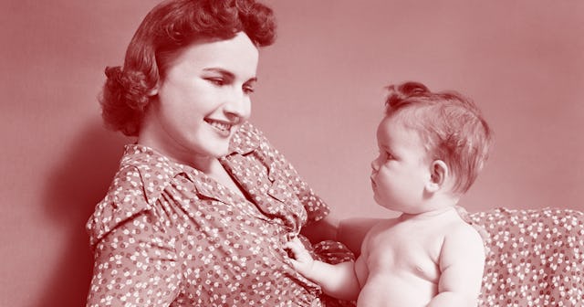 A baby playing with a narcissistic mother with a pale pink color filter