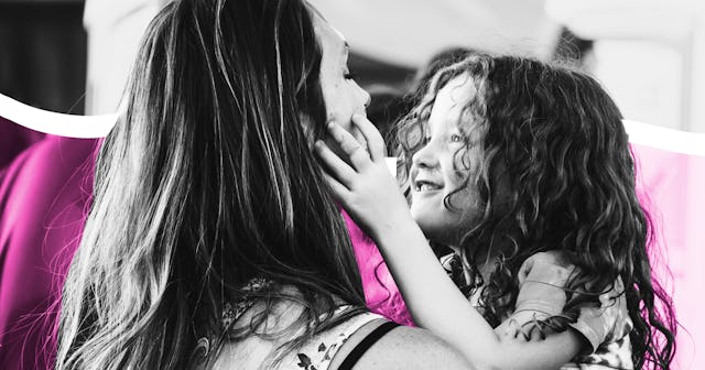 A mother and daughter hugging