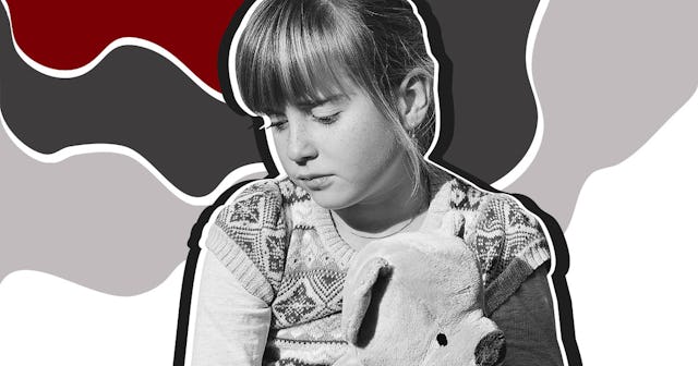 Little girl playing with her teddy bear during her developmental trauma