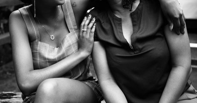 A daughter comforting her mother after she had an abortion