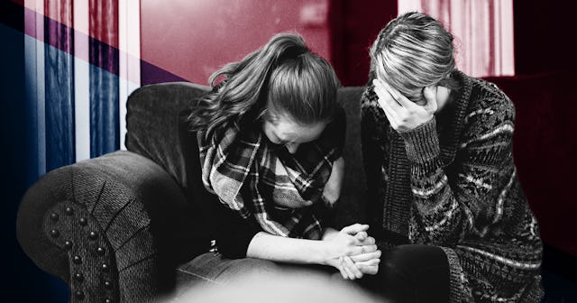 Two women sitting on the couch and mourning the loss of family members