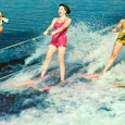 Three divorced women on water skiing 
