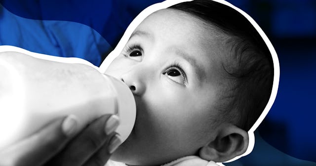 A mother feeding her child from a bottle that has formula milk in it