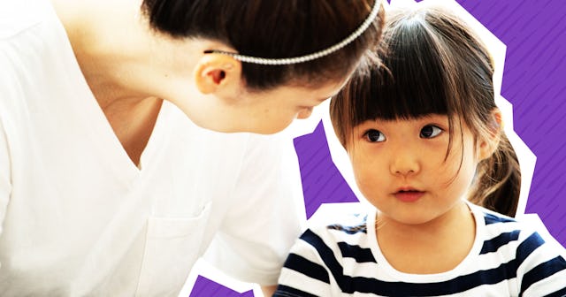 A mother looking at her child talking to her instead of giving her a time-out