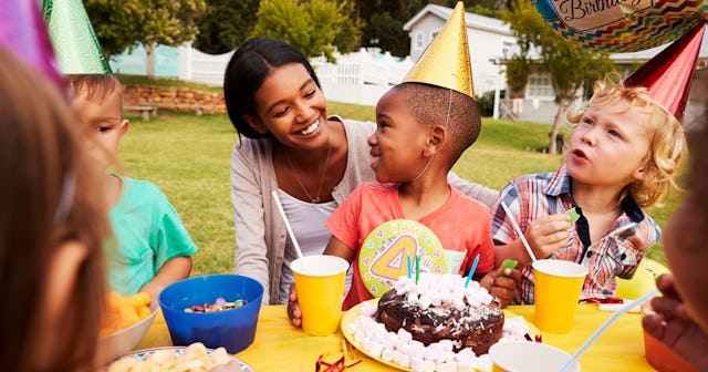 A mother with her son during the celebration of his fourth birthday