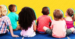 Little kids sitting in preschool 