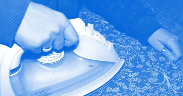 A woman ironing clothes 