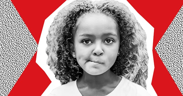 A curly-haired girl in black and white with a cropped frame with red and black on white dotted secti...