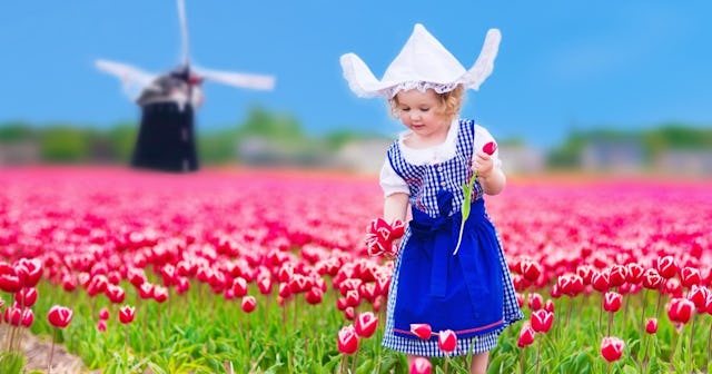 dutch baby names, girl in a flower field