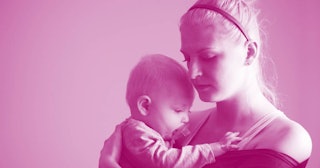 Young mom holding and hugging her little baby with a pink color filter