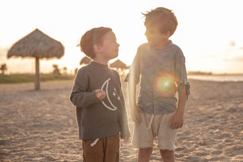 Two boys at the sandy beach