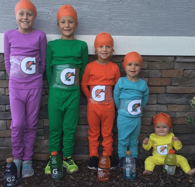 Boys and girls wearing purple, green, orange, blue, and yellow Gatorade kids' costumes