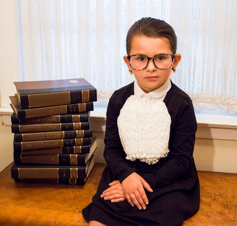 A Ruth Bader Ginsburg Halloween costume worn by a girl