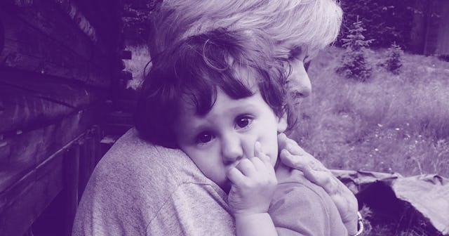 Grandma holding her grandkid