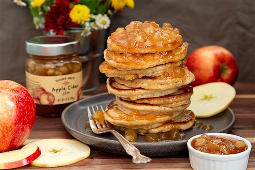 New at Trader Joe's, stack of pancakes beside a fork and some apple slices