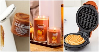 Three pumpkin spice products including pumpkin enzyme mask, a candle and pumpkin shaped waffle maker