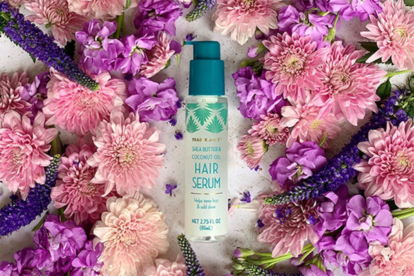 New at Trader Joe's; hair serum bottle surrounded by pink and purple flowers