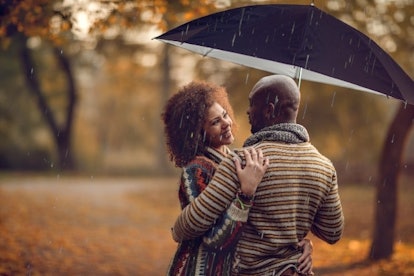 romantic couple in rainy season