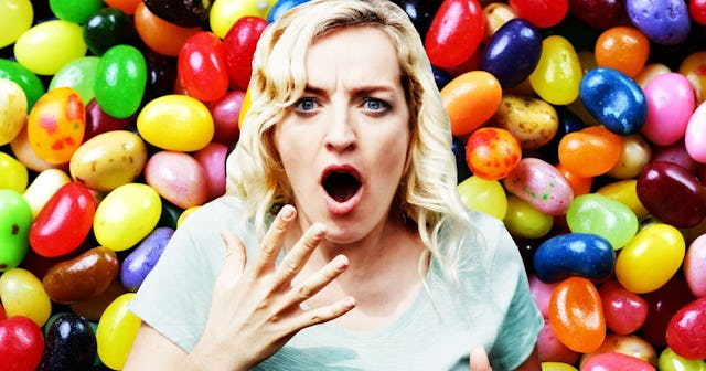 A woman surrounded with colorful jelly beans