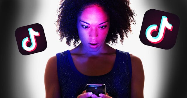 A woman with a shocked face discovers new things while watching a TikTok