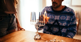 Family celebrating Hanukkah — Hanukkah traditions