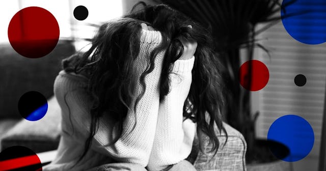A brown-haired girl, sitting on a couch pulling on her hair due to anxiety and depression