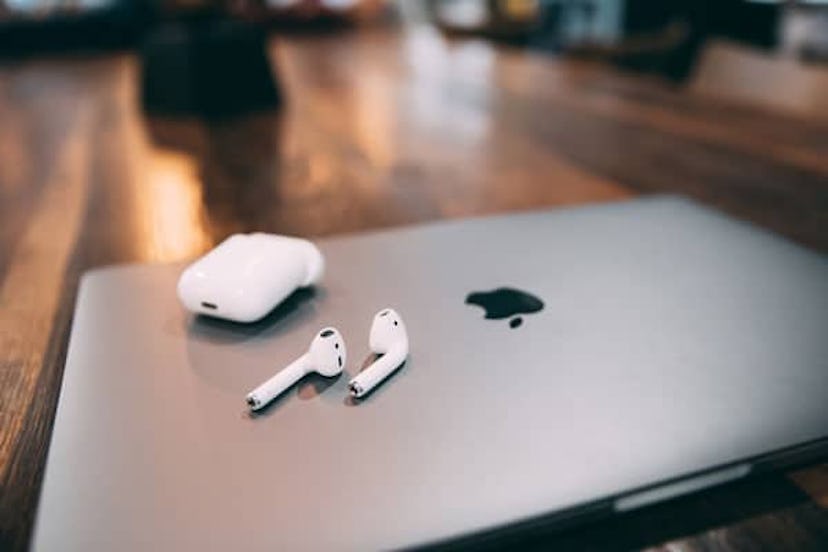 AirPods placed on the MacBook